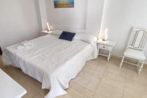 A bed or beds in a room at Canarian village house