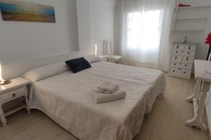 A bed or beds in a room at Canarian village house