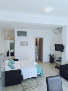 Posteľ alebo postele v izbe v ubytovaní Apartments Nina Riva
