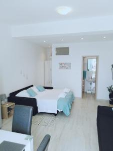 Posteľ alebo postele v izbe v ubytovaní Apartments Nina Riva