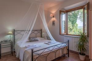 Postel nebo postele na pokoji v ubytování Le Tartarughe rooms