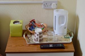 a counter with a mixer and a remote control at Arlingtons in Blackpool