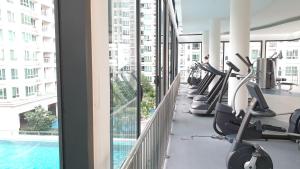 a gym with treadmills and exercise equipment in a building at V residence suite 2-4 pax - mrt-wifi-link mall 吉隆玻双威伟乐高级公寓 in Kuala Lumpur