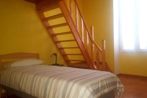 Ein Bett oder Betten in einem Zimmer der Unterkunft Casa Familiar CD