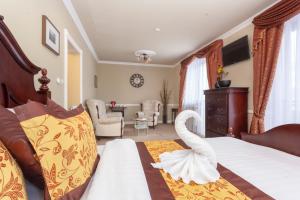 Katil atau katil-katil dalam bilik di Winter & Summer Resort