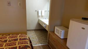 Postel nebo postele na pokoji v ubytování Royal Motor Inn