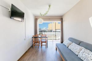 A television and/or entertainment centre at PARADISE IBIZA ( Apto. Turístico 1 llave )