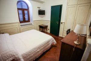 Postel nebo postele na pokoji v ubytování Olimpus