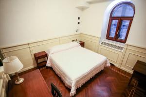 Postel nebo postele na pokoji v ubytování Olimpus