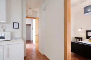 Küche/Küchenzeile in der Unterkunft Urban Suites Granada