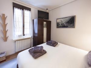 Voodi või voodid majutusasutuse Cosy Room - Guggen º PARKING FREE toas
