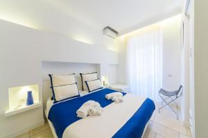 Кровать или кровати в номере Villa Fortuna Holiday Resort