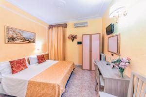 A bed or beds in a room at Downtown Accommodation