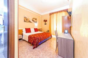 A bed or beds in a room at Downtown Accommodation