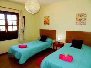 Postel nebo postele na pokoji v ubytování Casita Joli + 37 fotografií