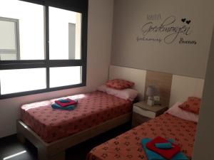 Posteľ alebo postele v izbe v ubytovaní Casa Higuericas- Penthouse Beach - Torre de la Horadada