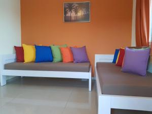 A bed or beds in a room at Cavo Plako Villas