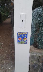 a box with a sticker on the side of a wall at Ustica Mari e Carlo Contrada Ogliastrello in Ustica