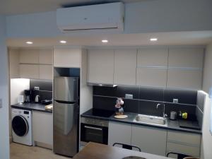 A kitchen or kitchenette at Beautiful studio next to ancient stadium