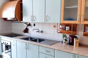 A kitchen or kitchenette at 2-level BIG space near beach, bars, walking street