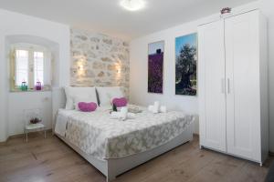 Postel nebo postele na pokoji v ubytování Guest House Babina - Apartments King & Queen
