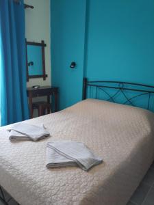 Postel nebo postele na pokoji v ubytování Sokaki rooms