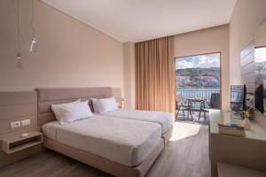 Postel nebo postele na pokoji v ubytování PALMA city HOTEL