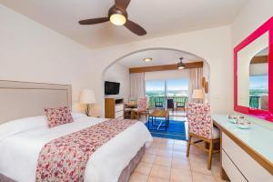 Postel nebo postele na pokoji v ubytování Villa del Palmar Beach Resort & Spa