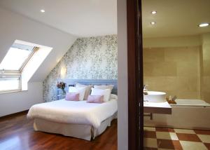 
Cama o camas de una habitación en Hotel Garelos Betanzos
