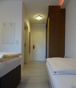 Postel nebo postele na pokoji v ubytování Aktiv Hotel Winterberg