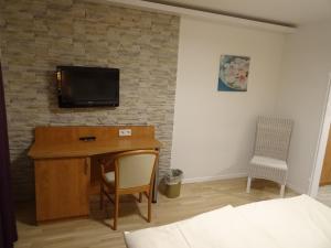 TV a/nebo společenská místnost v ubytování Aktiv Hotel Winterberg