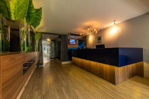 a room with a wooden floor and a wooden ceiling at Hotel Blue Concept in Cartagena de Indias