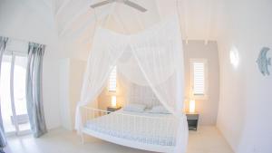 
Een bed of bedden in een kamer bij Villa Nautilus
