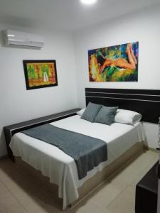 Katil atau katil-katil dalam bilik di Hotel Palms Central