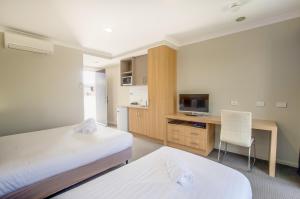 Campaspe Lodge客房内的一张或多张床位