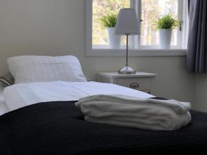 Postel nebo postele na pokoji v ubytování Hedenstugan B&B Hotel
