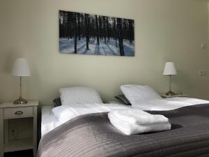 Postel nebo postele na pokoji v ubytování Hedenstugan B&B Hotel