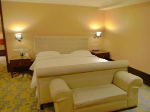 Letto o letti in una camera di Kai Wei Boutique Hotel
