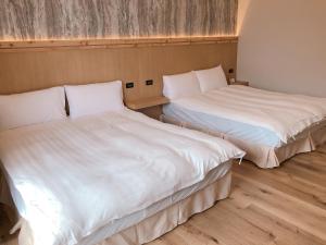 Postel nebo postele na pokoji v ubytování MountainTraveler