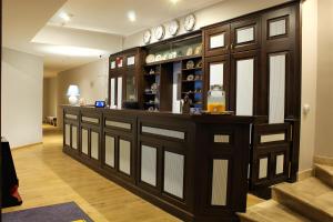 Nápoje v ubytování New Era Hotel Old Town Bucharest parking with fee nearby