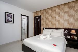 Postelja oz. postelje v sobi nastanitve Dylan Hotel Danang