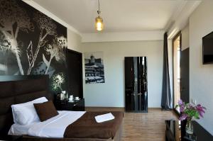 TV a/nebo společenská místnost v ubytování Hotel Marsel