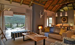 Posezení v ubytování Garden Route Safari Camp