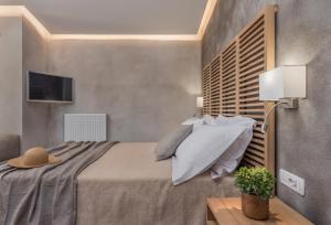 Postel nebo postele na pokoji v ubytování Phoenix Hotel