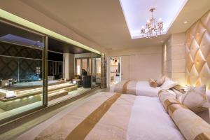 Voodi või voodid majutusasutuse HOTEL Dior7 toas
