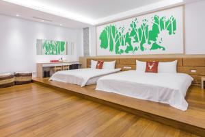 Postel nebo postele na pokoji v ubytování CHEN FENG HOMESTAY + 37 fotografií