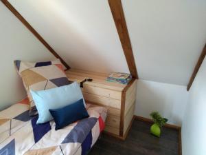 Łóżko lub łóżka w pokoju w obiekcie Dolina Rosy