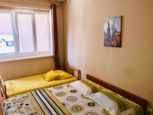 Postel nebo postele na pokoji v ubytování Apartment Riva