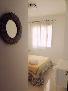 A bed or beds in a room at Benalmarina Sea View Apartments