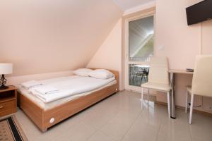 Posteľ alebo postele v izbe v ubytovaní Villa Tara